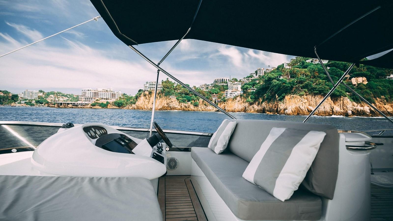 a boat on the water aboard LUCKY BEAR Yacht for Sale