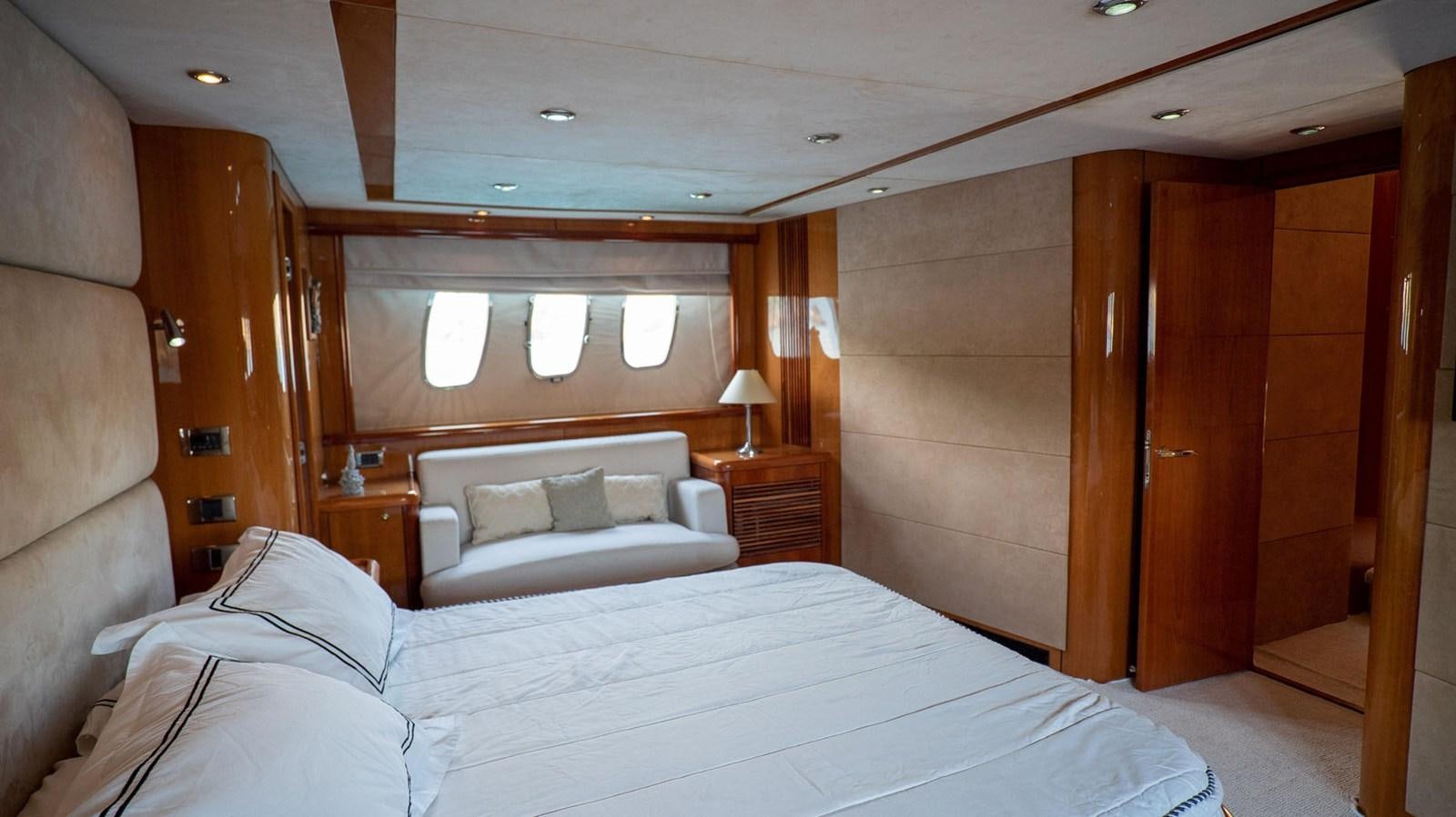 a bed in a room aboard LUCKY BEAR Yacht for Sale