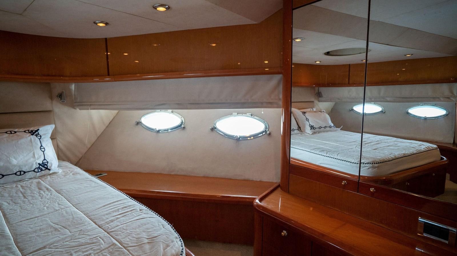 a room with two beds aboard LUCKY BEAR Yacht for Sale