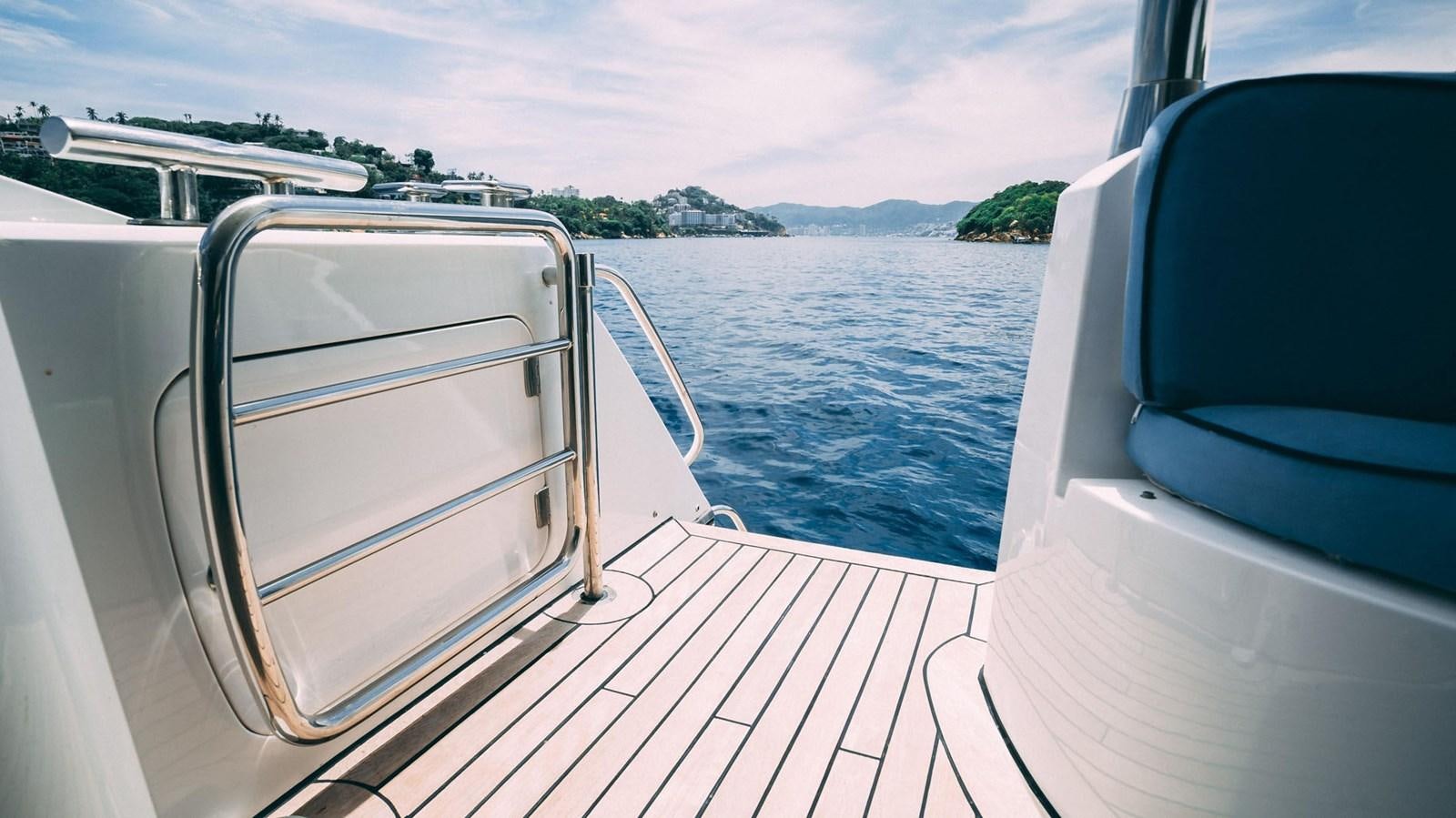 a boat on the water aboard LUCKY BEAR Yacht for Sale