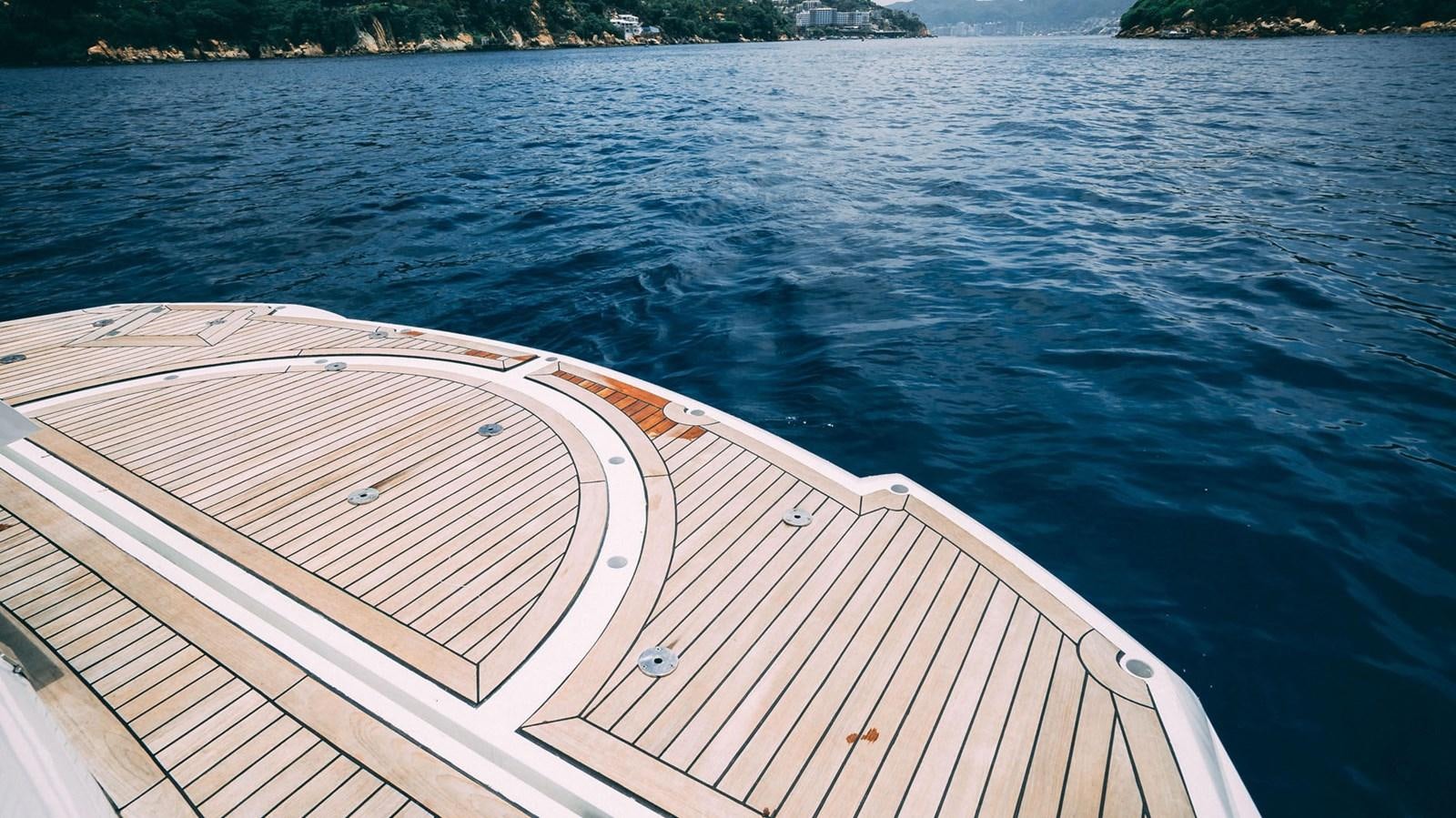 a boat on the water aboard LUCKY BEAR Yacht for Sale