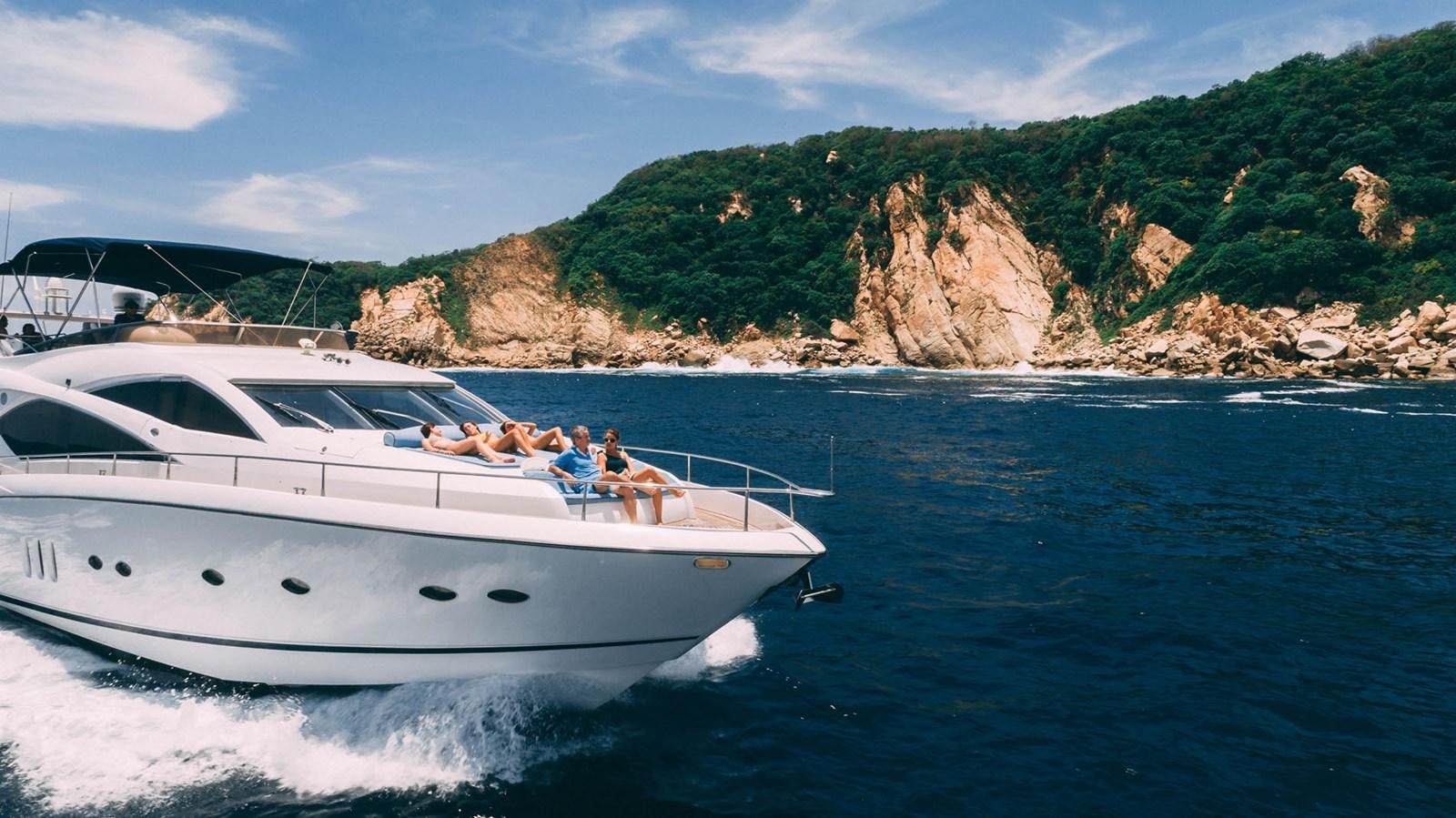 a boat with people on it aboard LUCKY BEAR Yacht for Sale
