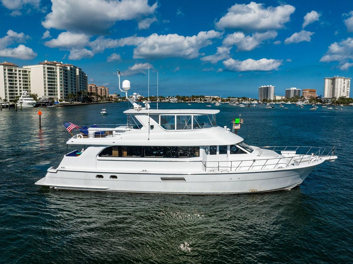 a white yacht in the water aboard DIAMOND LADY Yacht for Sale