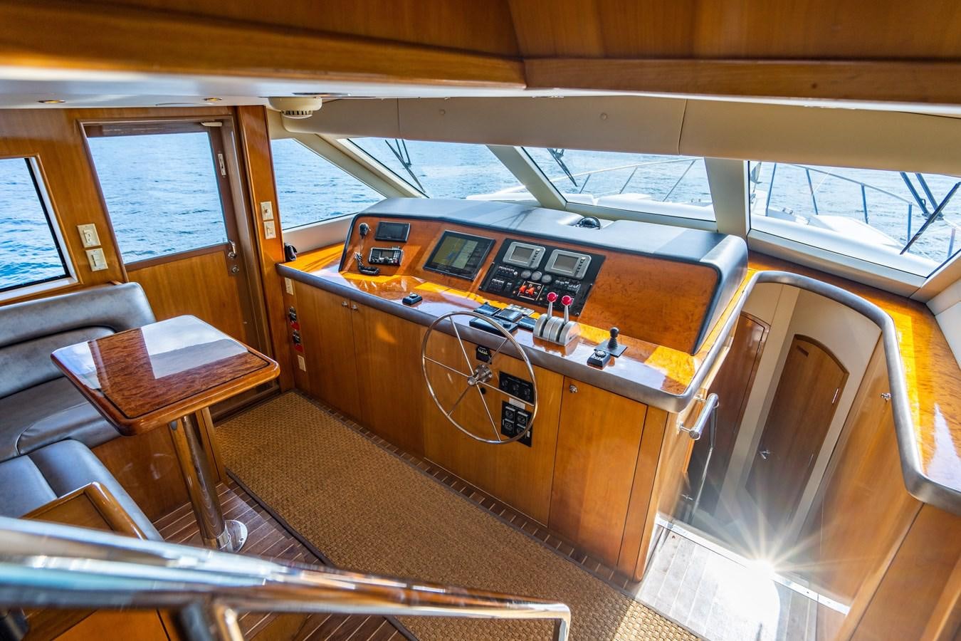 a bus with a desk and a bench aboard DIAMOND LADY Yacht for Sale