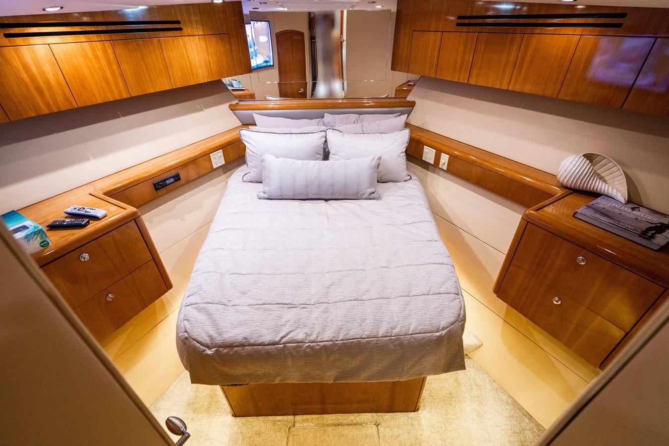 a bed in a room aboard DIAMOND LADY Yacht for Sale