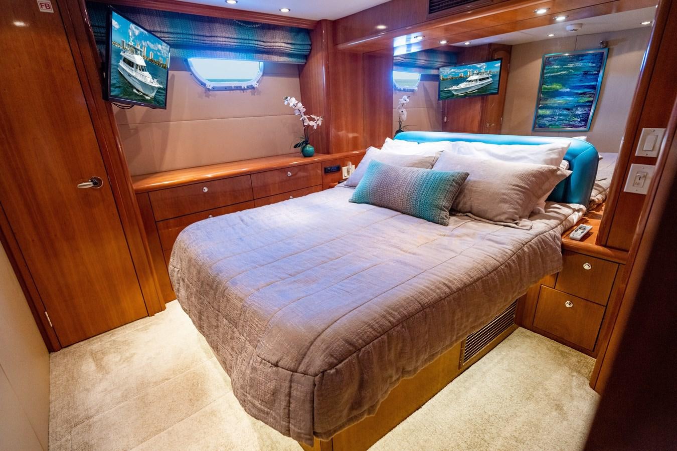 a bed in a room aboard DIAMOND LADY Yacht for Sale