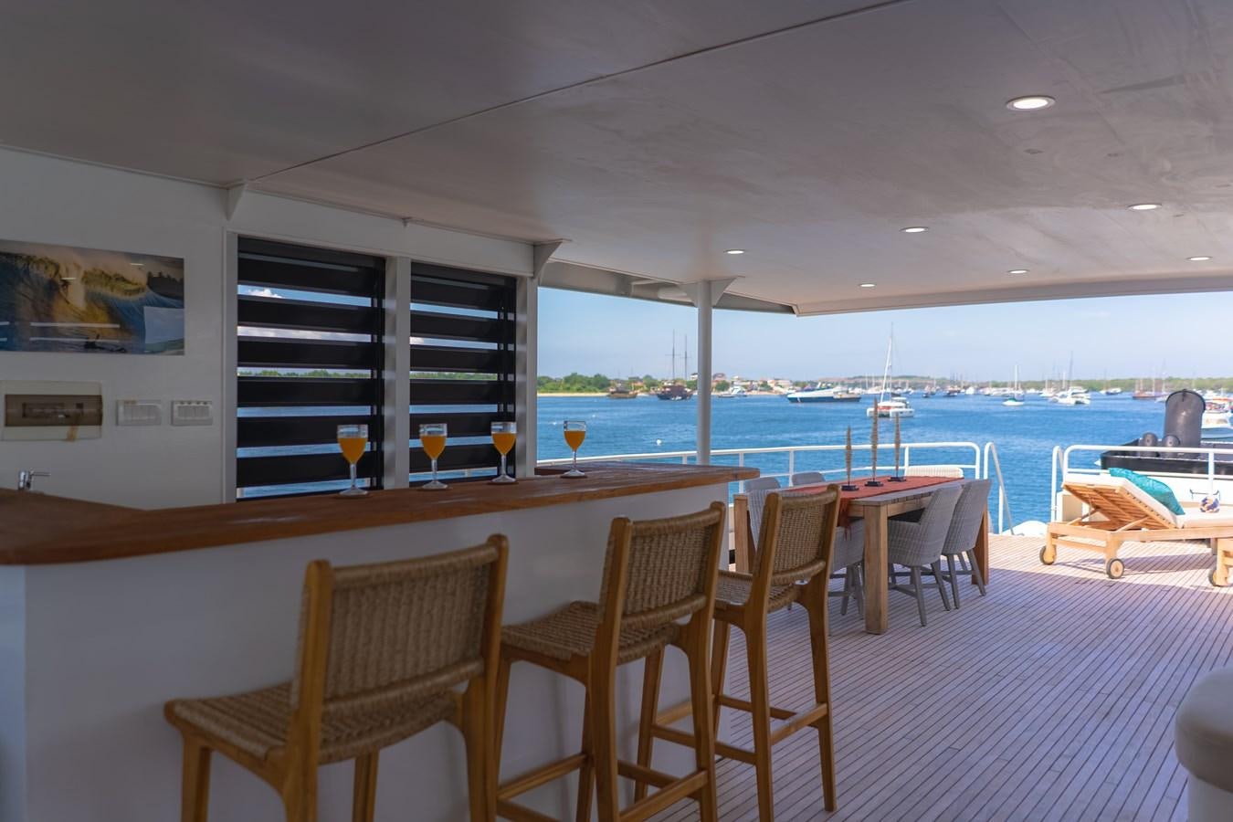 a room with a table and chairs aboard SOUTHERN CROSS Yacht for Charter