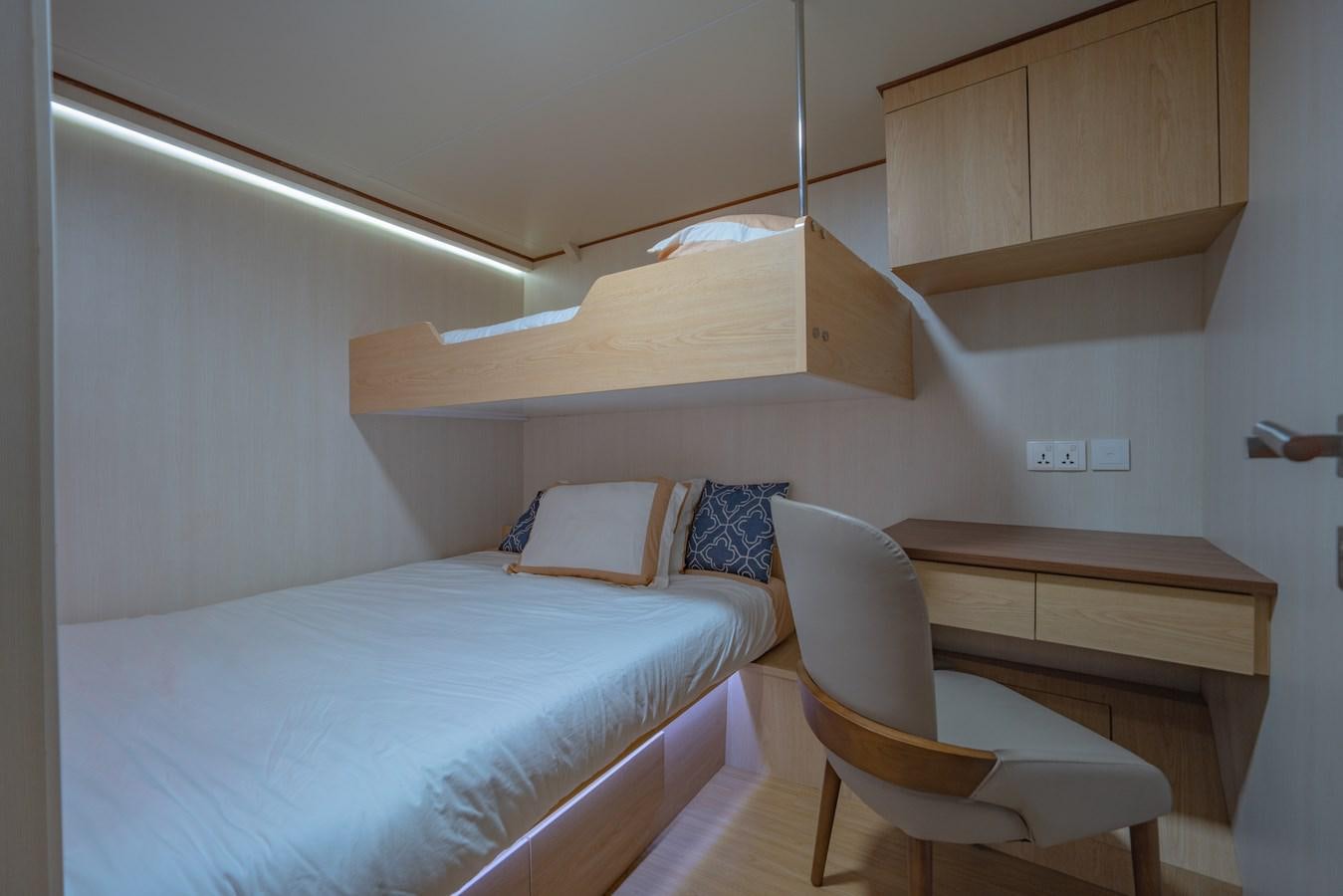 a room with two beds aboard SOUTHERN CROSS Yacht for Charter