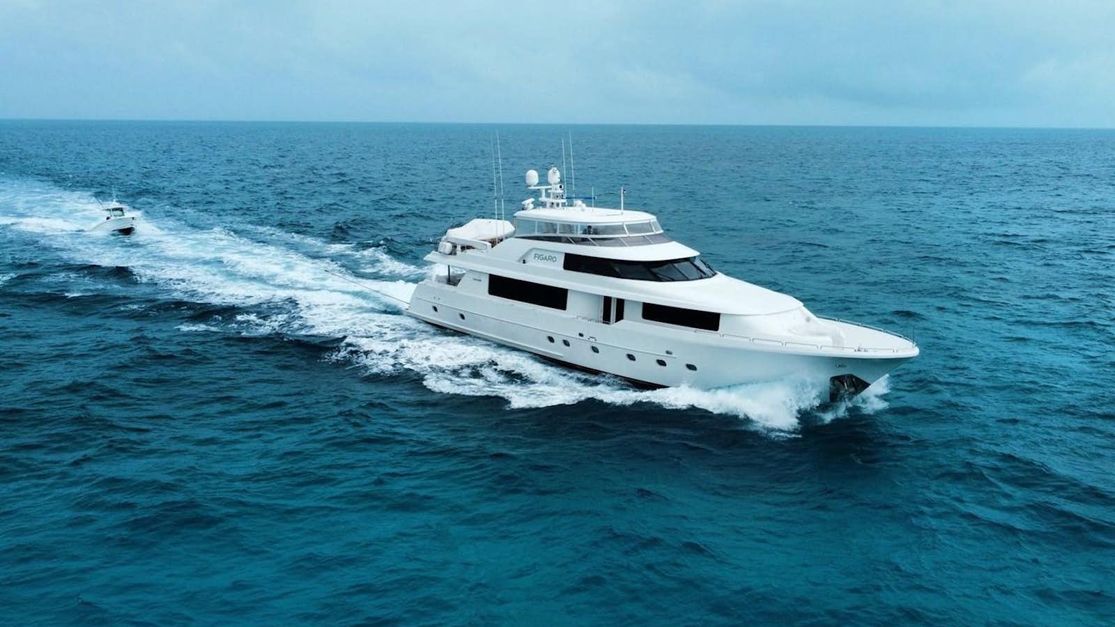 a white yacht in the ocean aboard YES Yacht for Sale