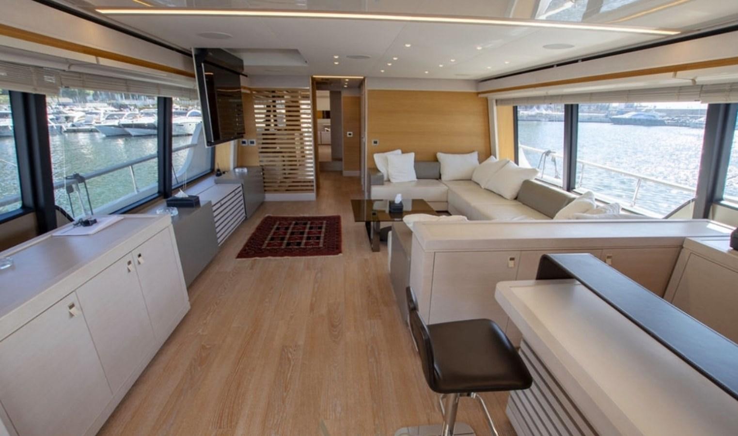 a room with a bed and a table aboard D'VINCI Yacht for Sale