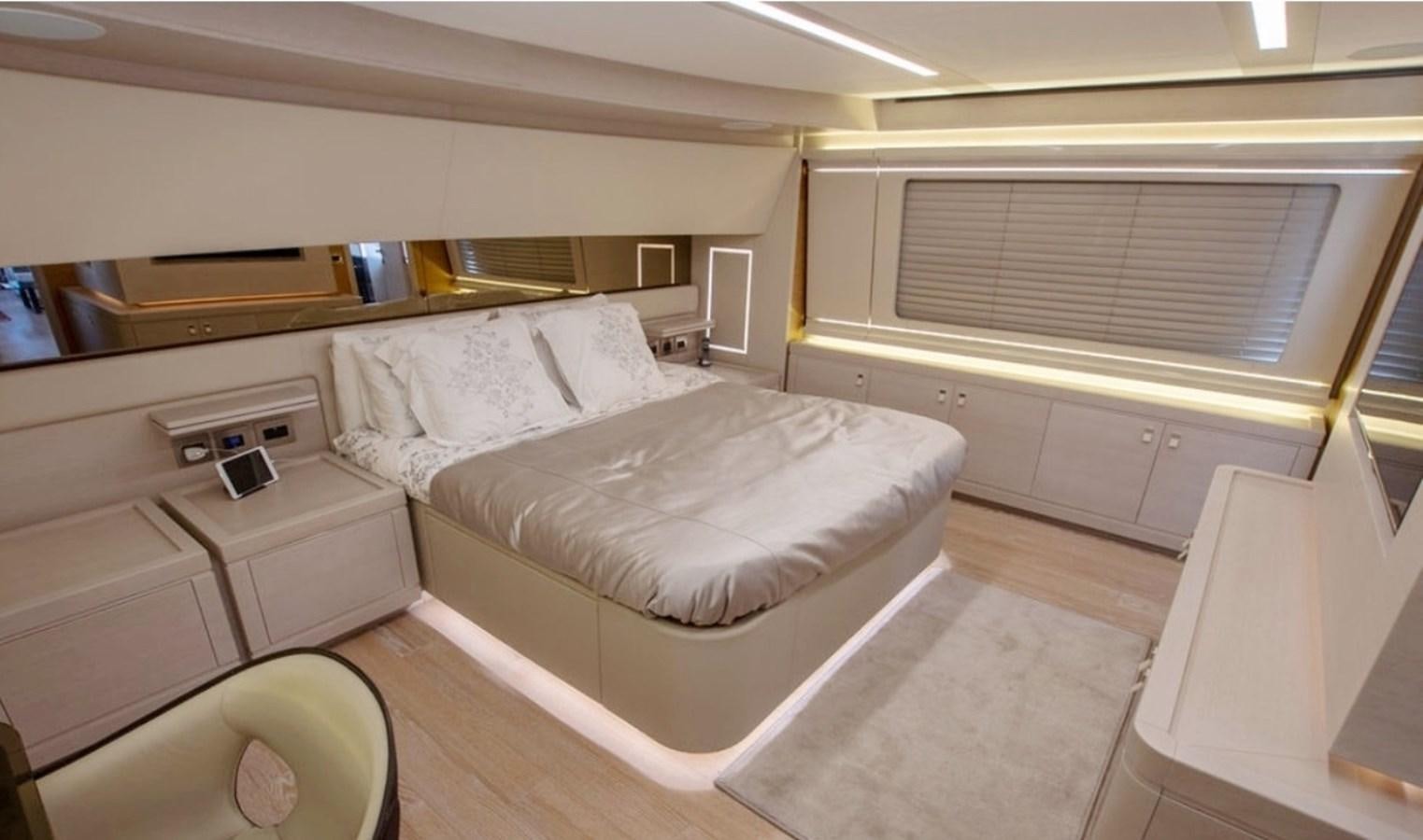a room with beds and a window aboard D'VINCI Yacht for Sale