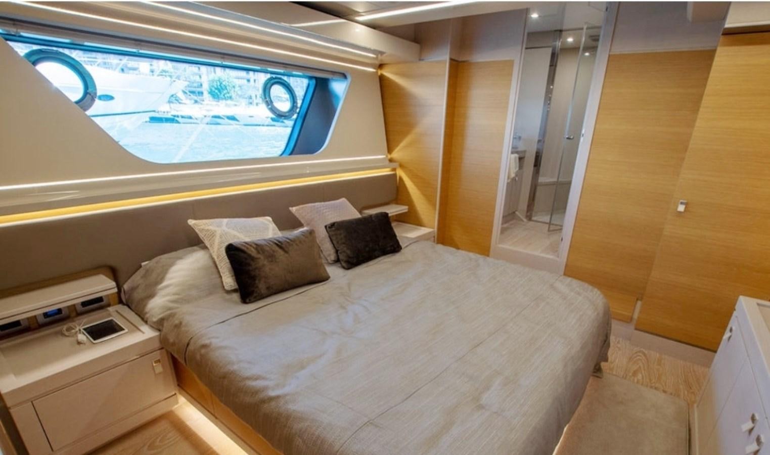 a bed in a room aboard D'VINCI Yacht for Sale