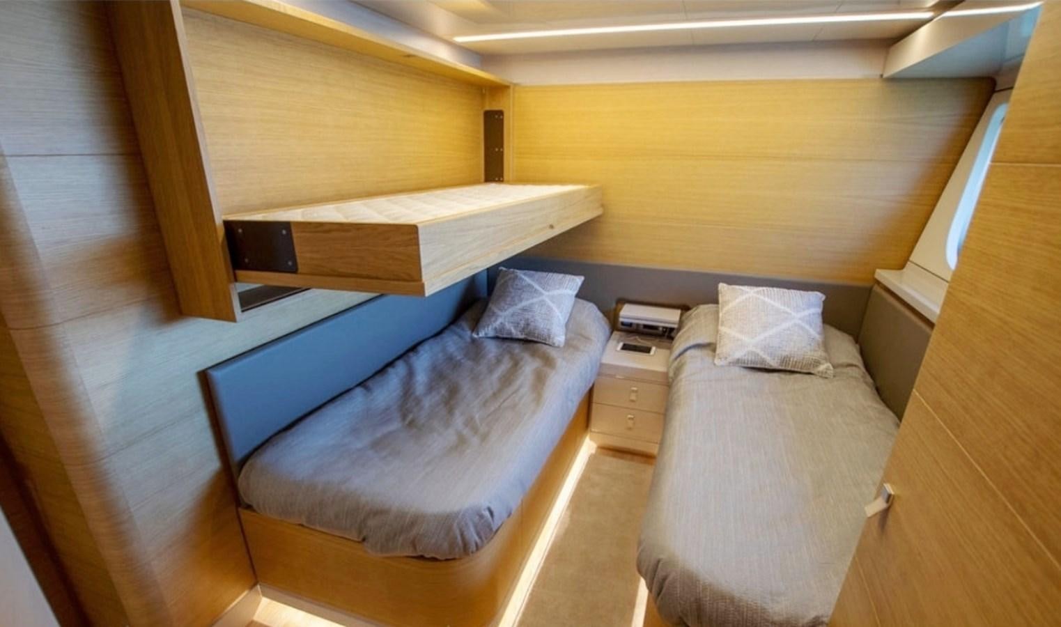a room with two beds aboard D'VINCI Yacht for Sale