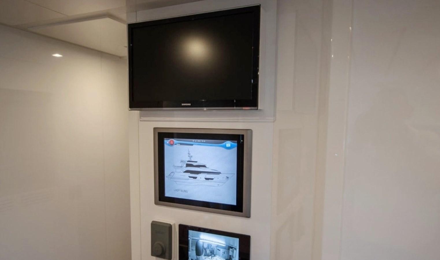 a tv on a stand aboard D'VINCI Yacht for Sale