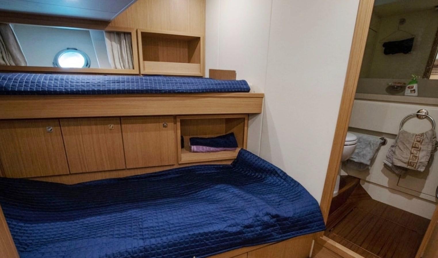 a bed in a room aboard D'VINCI Yacht for Sale