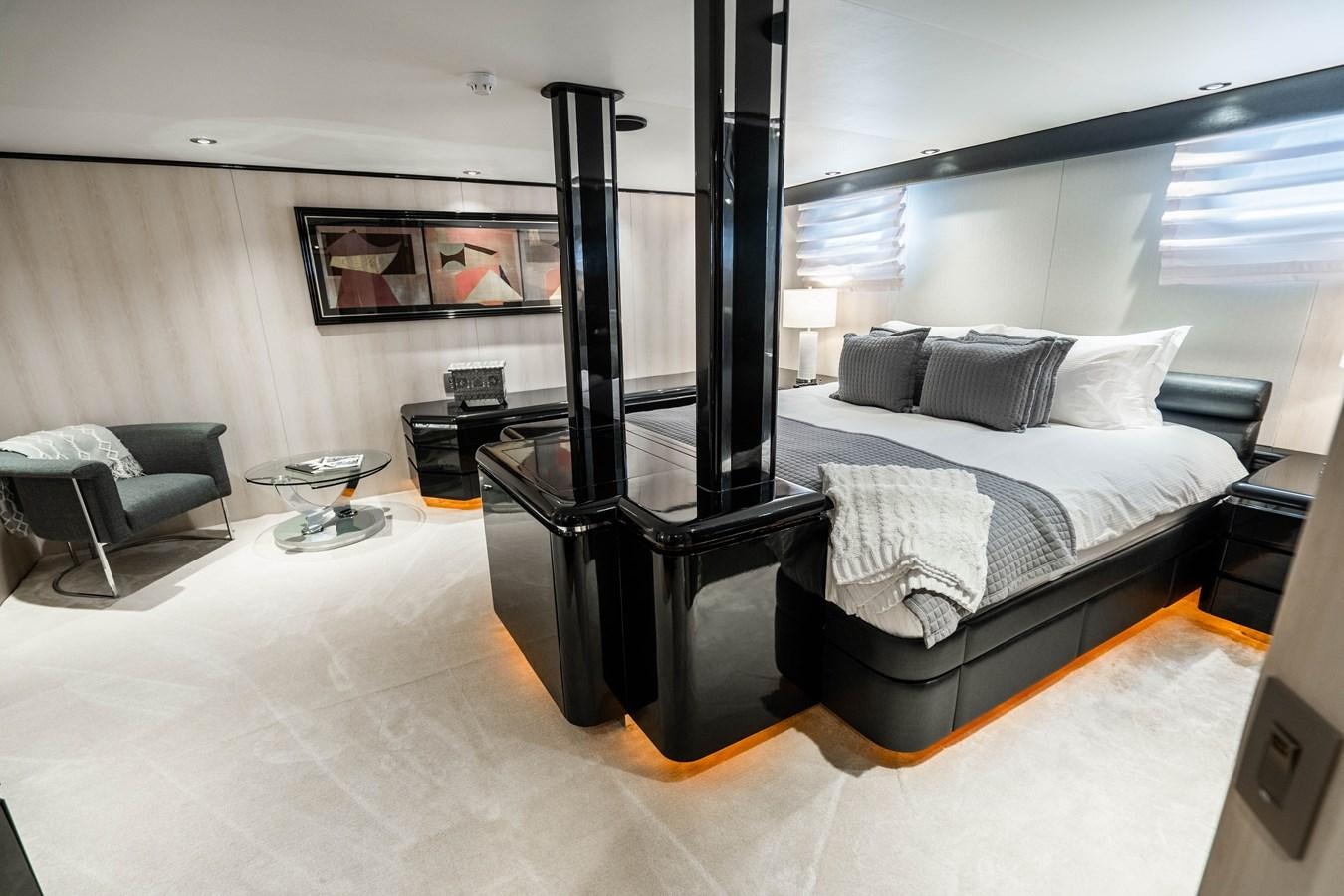 a bed in a room aboard QUANTUM Yacht for Sale