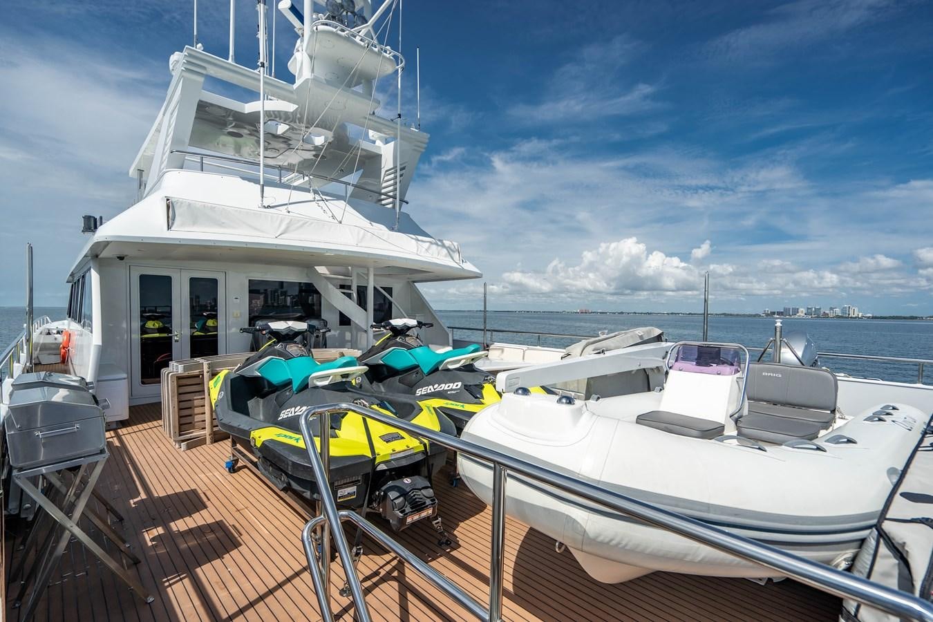 a boat docked at a pier aboard QUANTUM Yacht for Sale