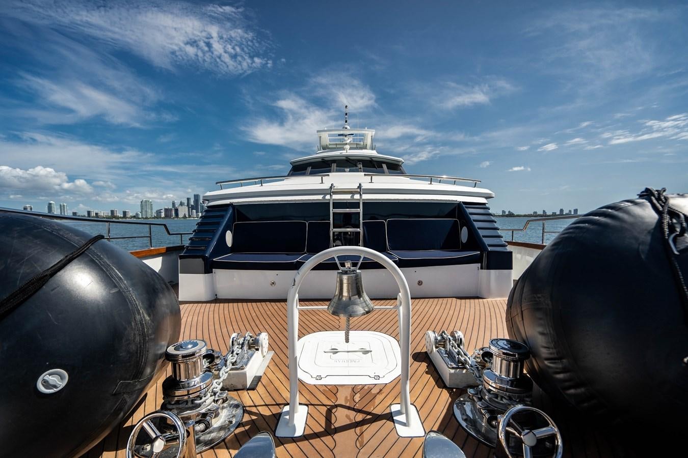 a boat docked at a pier aboard QUANTUM Yacht for Sale