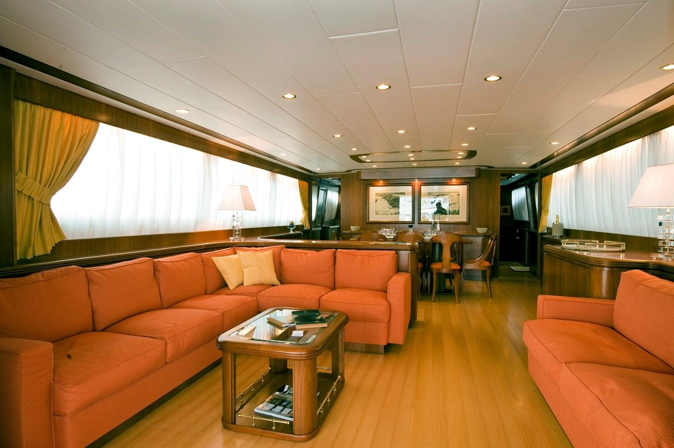 a living room with a wood floor aboard WATANGA Yacht for Sale