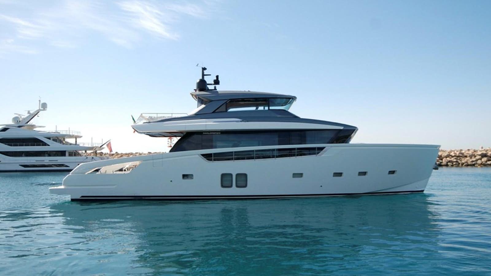 a couple of large white yachts in the water aboard SANLORENZO SX76 Yacht for Sale