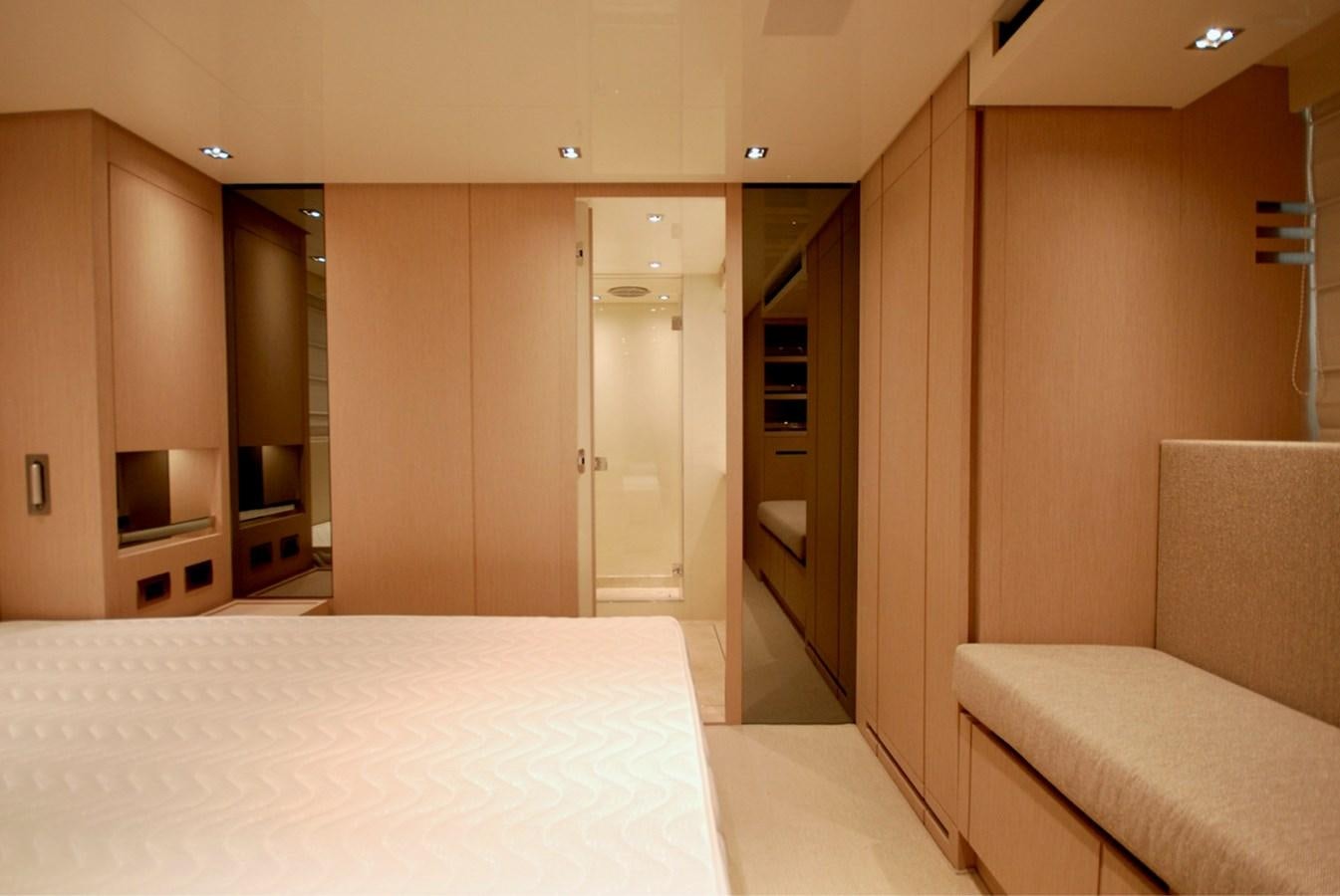 a hotel room with a bed and a couch aboard SANLORENZO SX76 Yacht for Sale