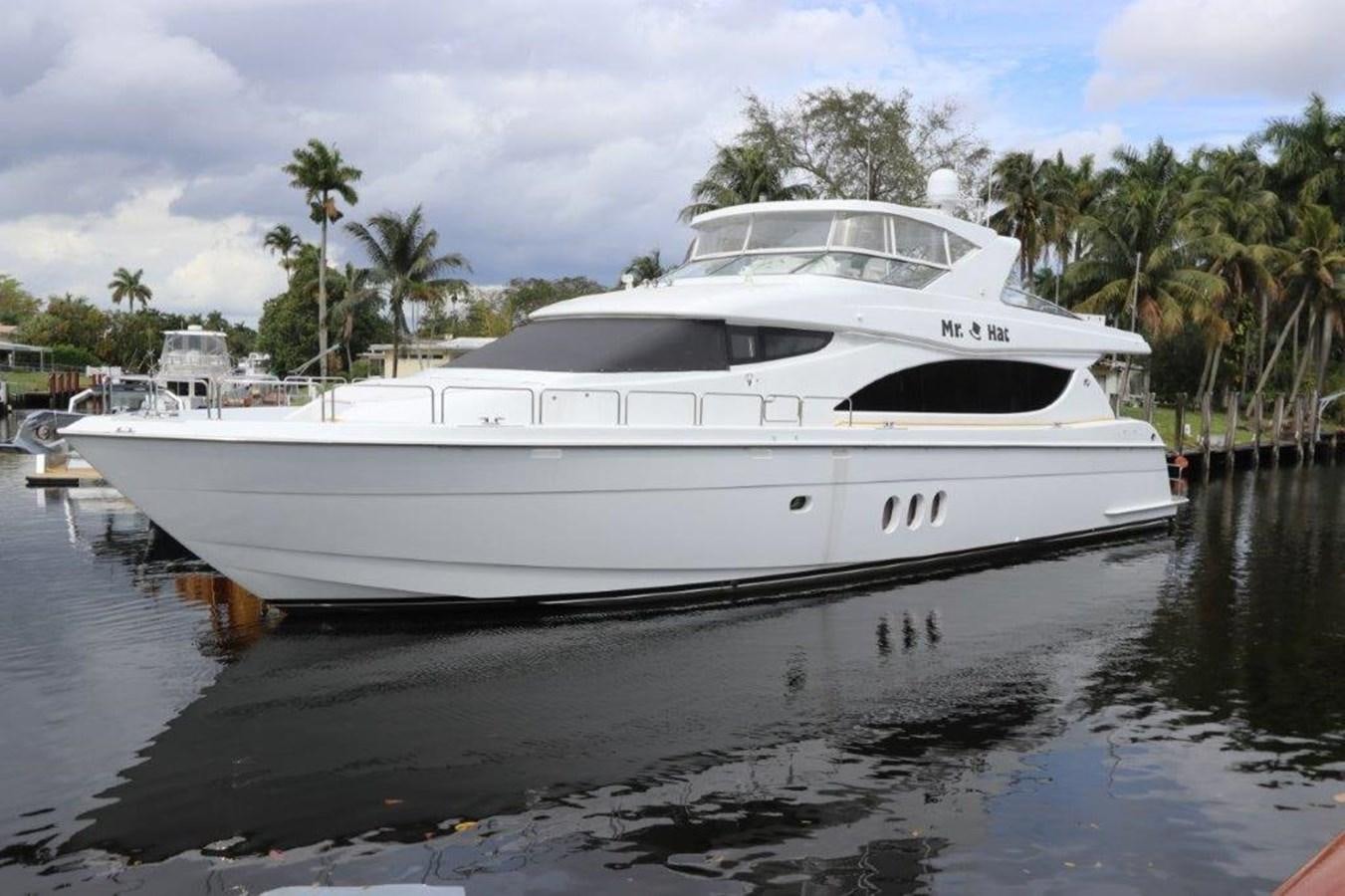 a white yacht in a body of water aboard HATGS618A606 Yacht for Sale