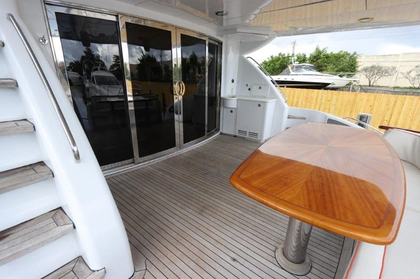 a table and chairs in a room aboard HATGS618A606 Yacht for Sale