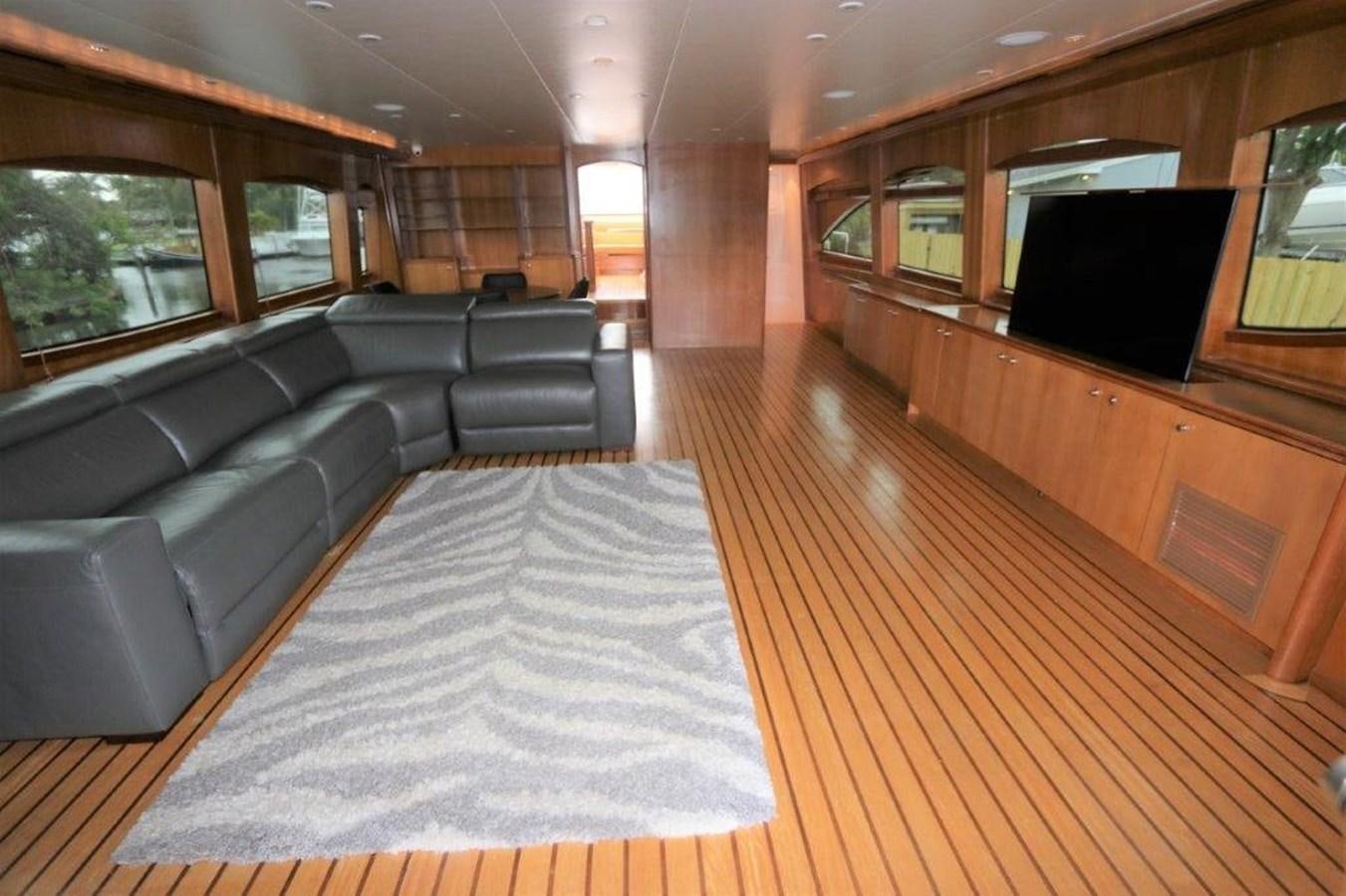 a large room with a couch and a tv aboard HATGS618A606 Yacht for Sale