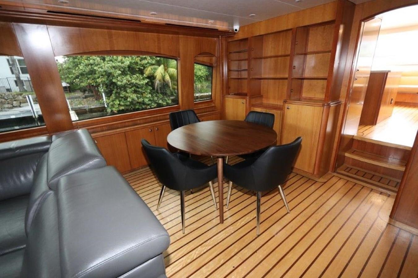 a room with a table and chairs aboard HATGS618A606 Yacht for Sale