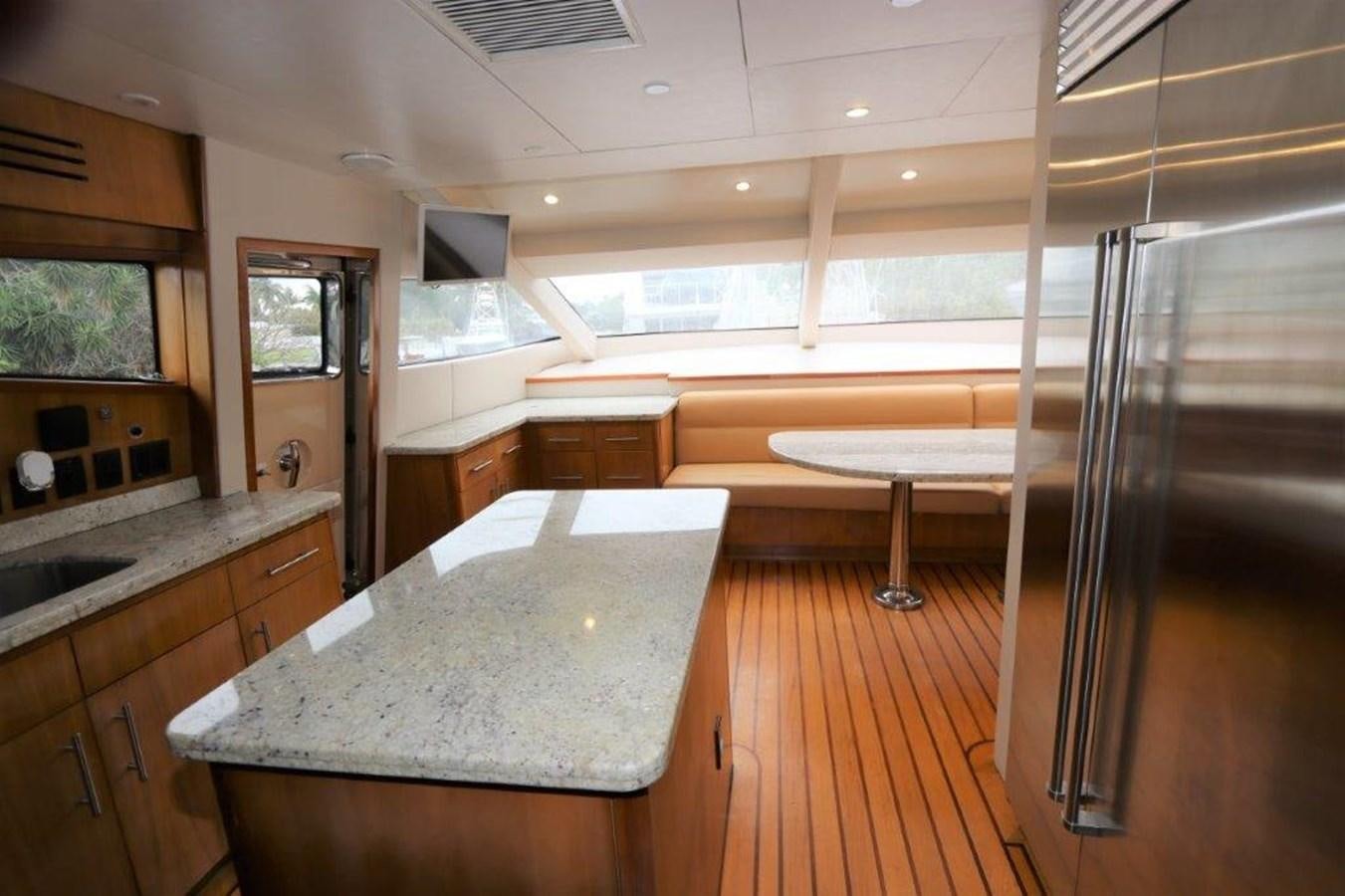 a kitchen with a large island aboard HATGS618A606 Yacht for Sale