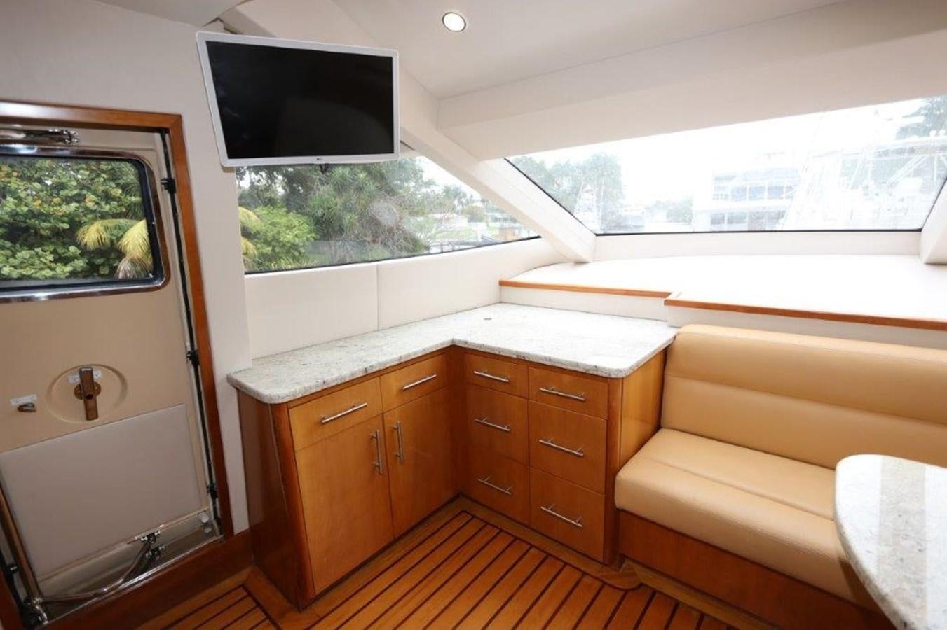 a living room with a couch and a television aboard HATGS618A606 Yacht for Sale