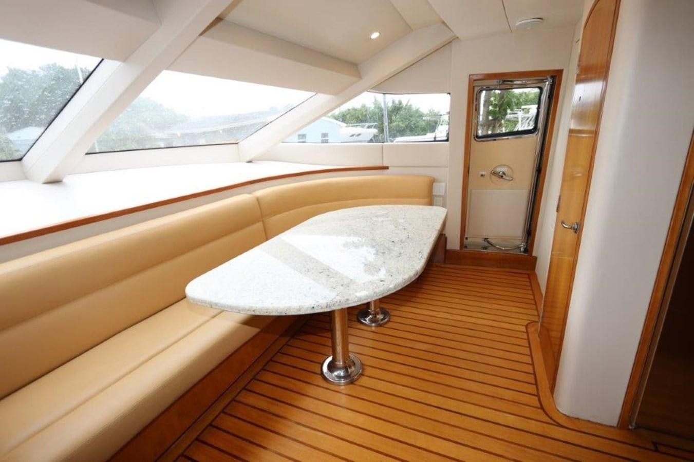 a room with a bed and a table aboard HATGS618A606 Yacht for Sale