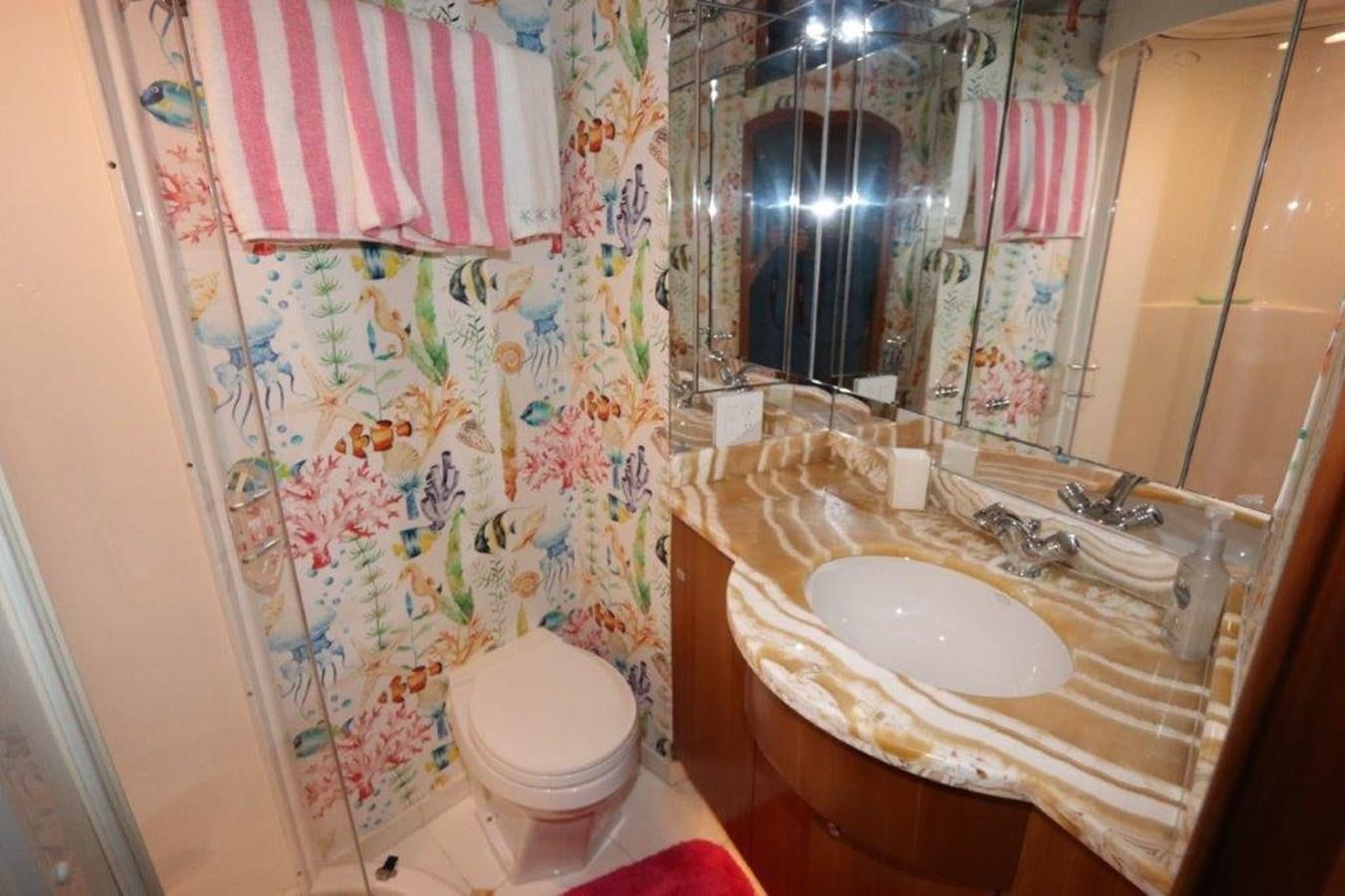a bathroom with a sink and toilet aboard HATGS618A606 Yacht for Sale