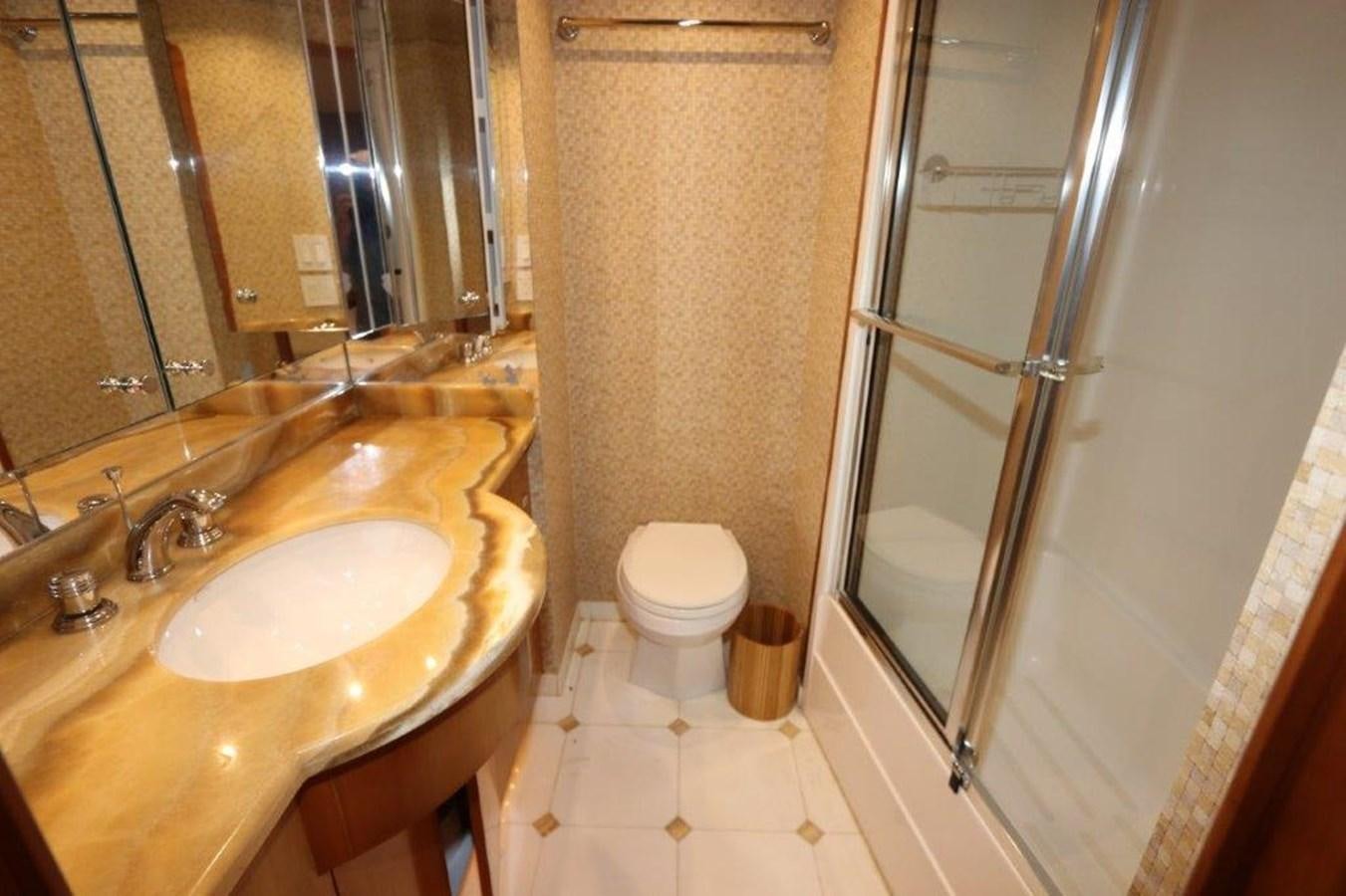 a bathroom with a sink toilet and shower aboard HATGS618A606 Yacht for Sale