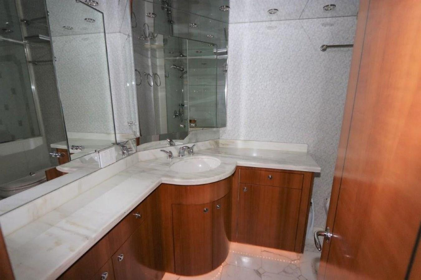 a bathroom with a large mirror aboard HATGS618A606 Yacht for Sale