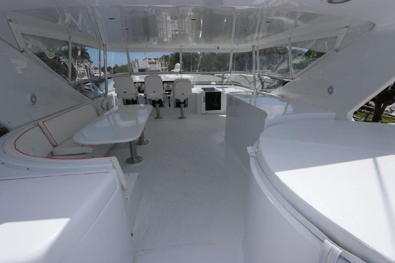 a room with white chairs and tables aboard HATGS618A606 Yacht for Sale