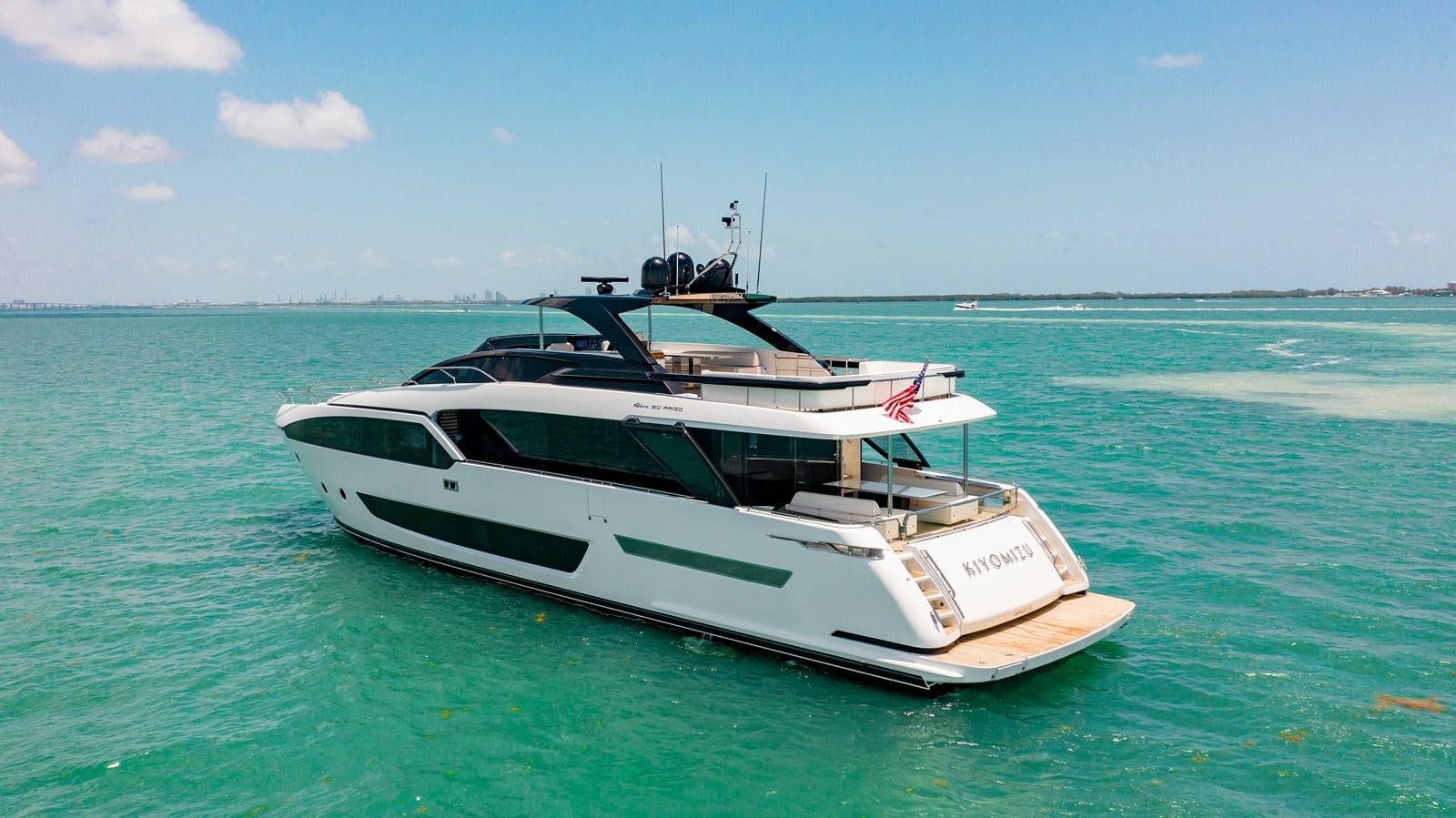 a white boat in the water aboard KIYOMIZU Yacht for Sale