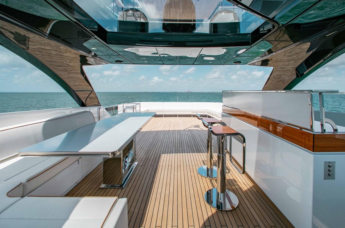 a deck with a deck and a pool aboard KIYOMIZU Yacht for Sale