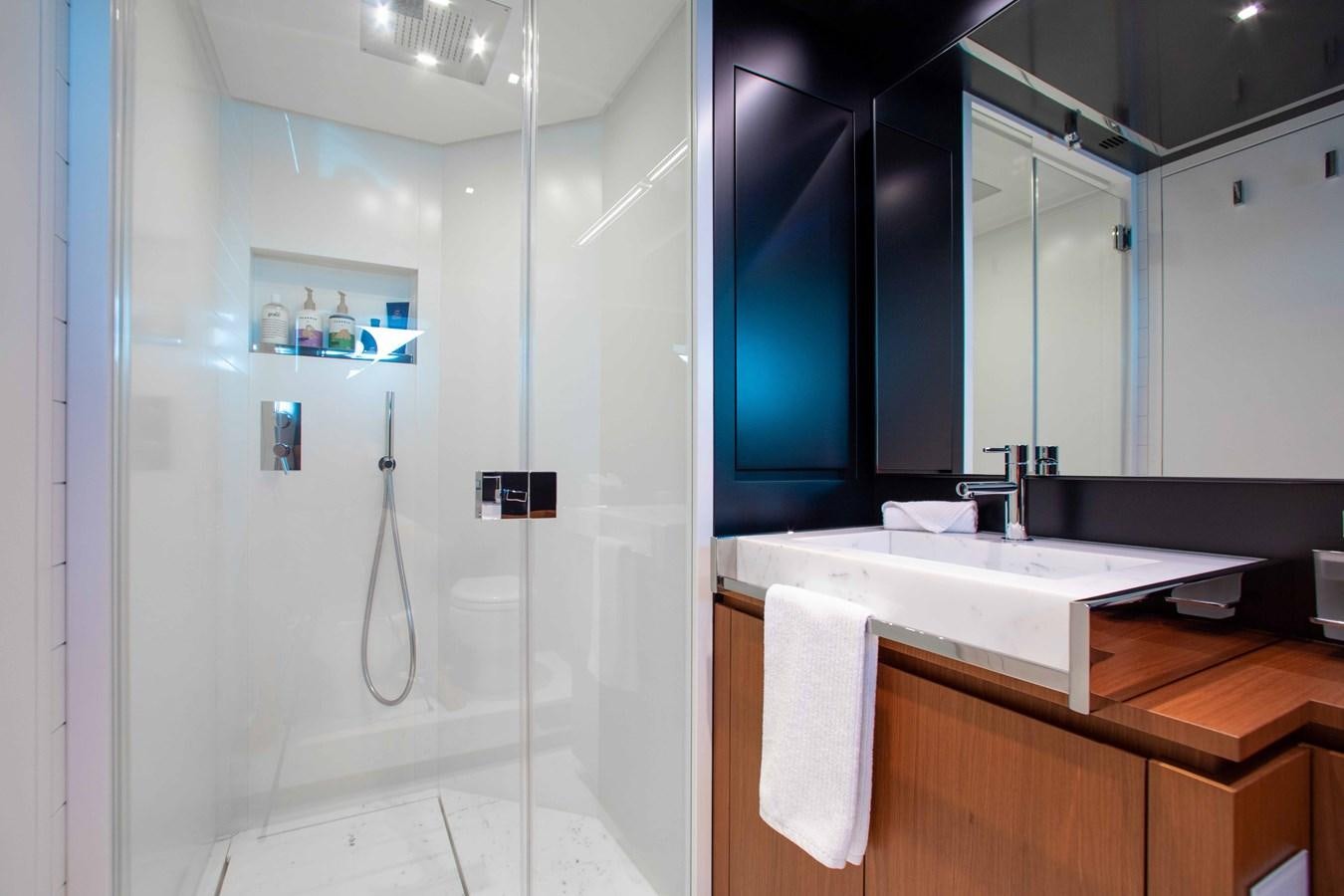 a bathroom with a sink and cabinets aboard KIYOMIZU Yacht for Sale