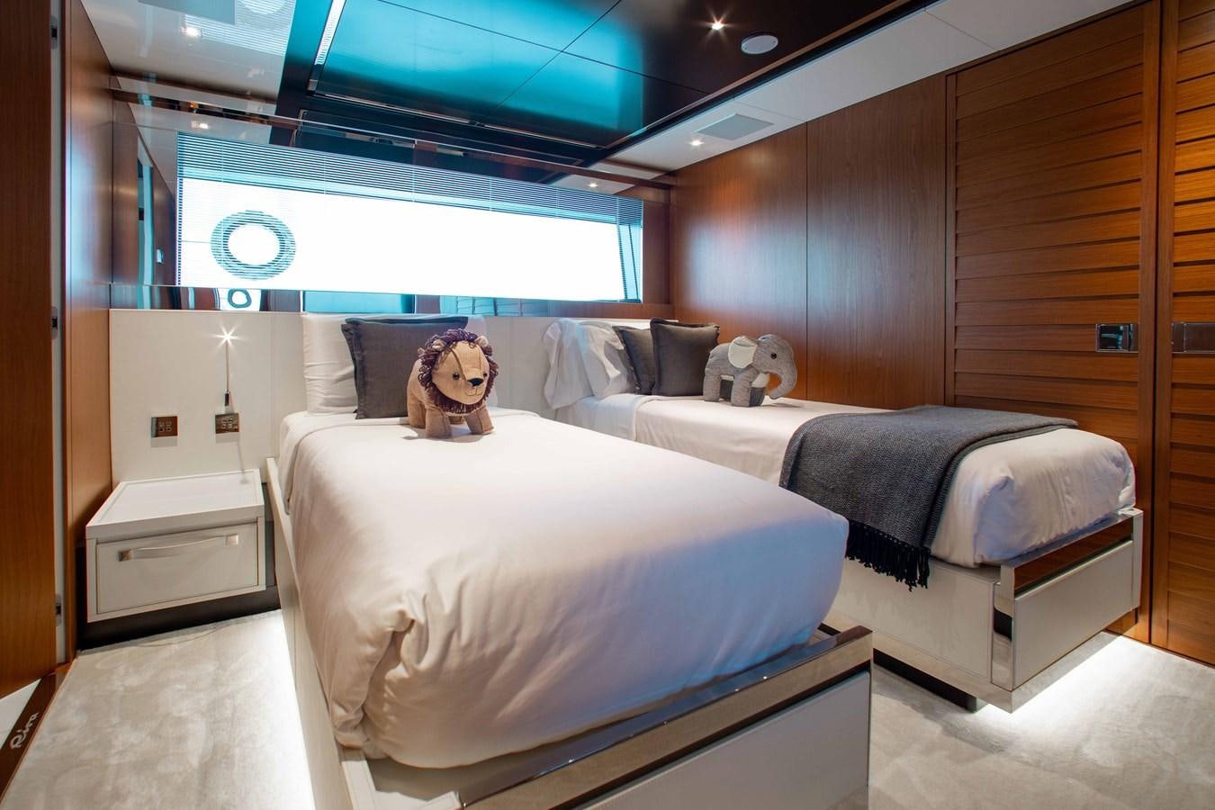 a room with two beds aboard KIYOMIZU Yacht for Sale