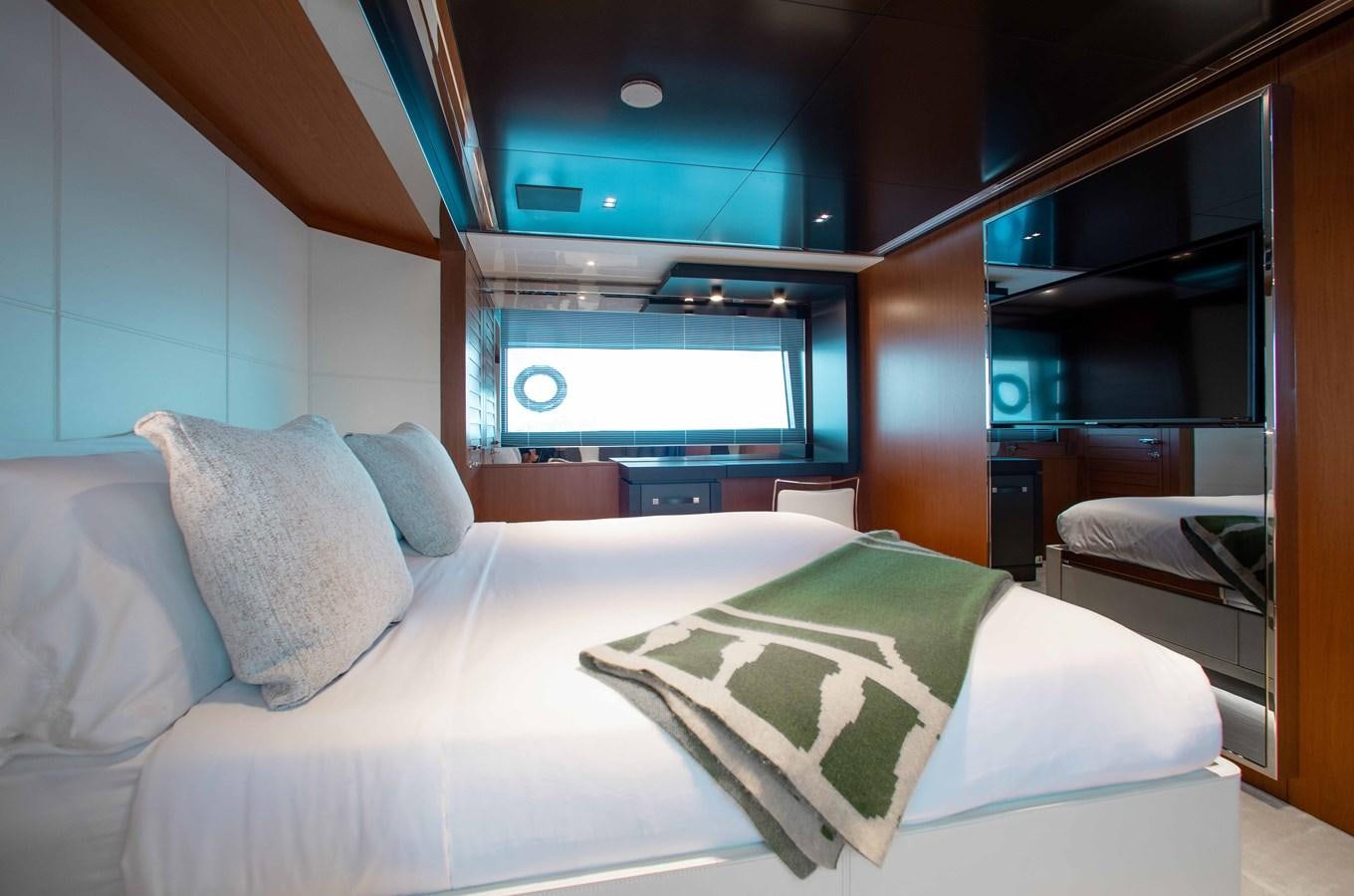 a bed with pillows aboard KIYOMIZU Yacht for Sale