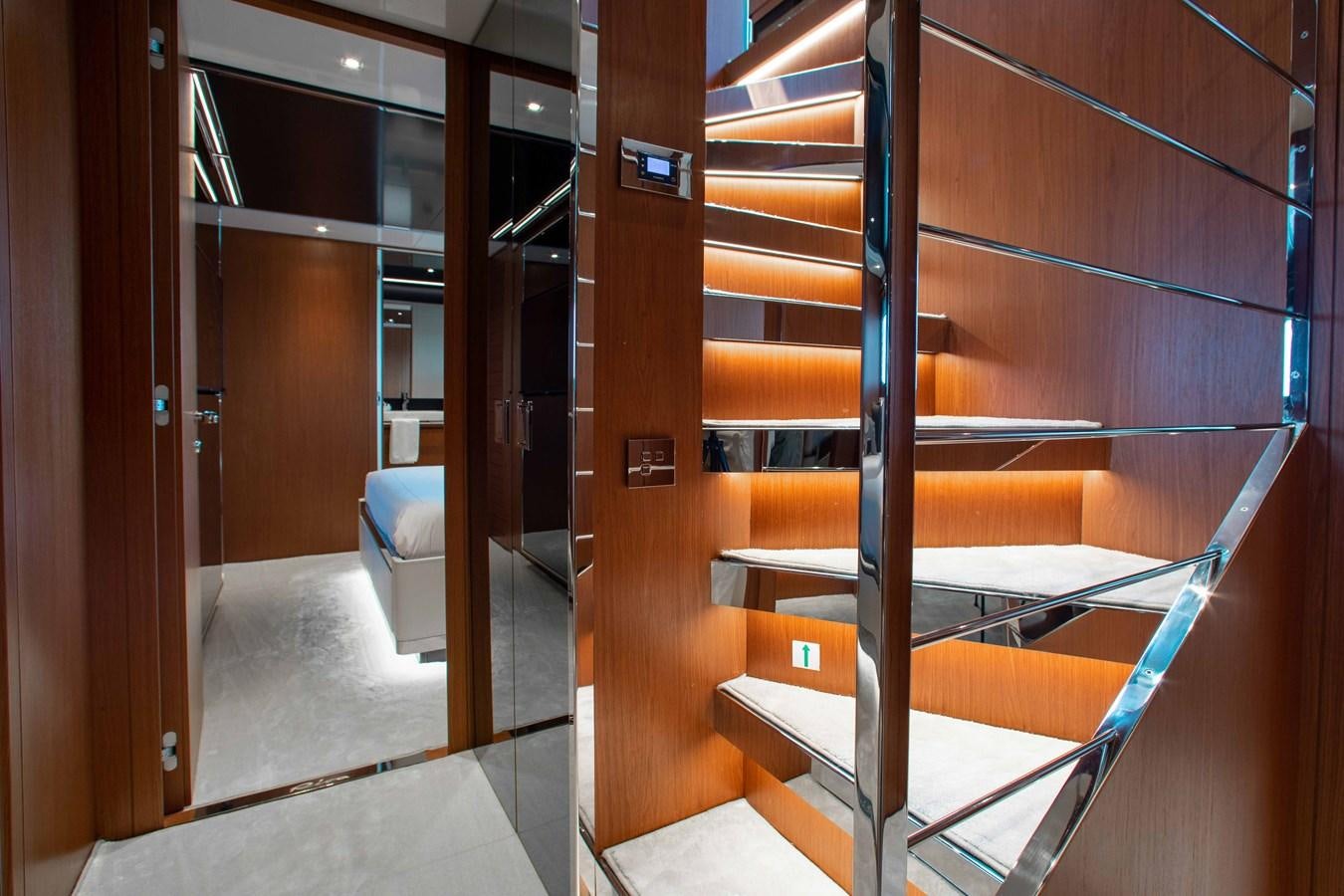 a room with wooden doors aboard KIYOMIZU Yacht for Sale