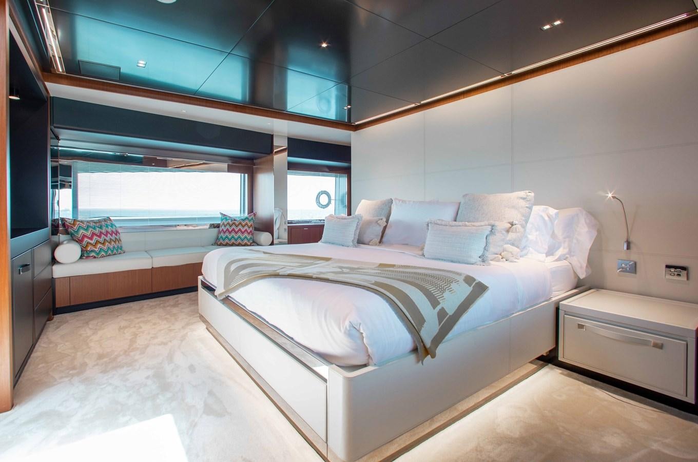 a room with a bed and a window aboard KIYOMIZU Yacht for Sale