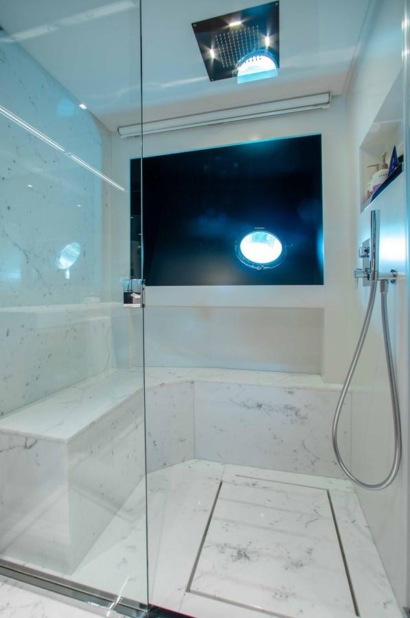 a room with a large screen aboard KIYOMIZU Yacht for Sale