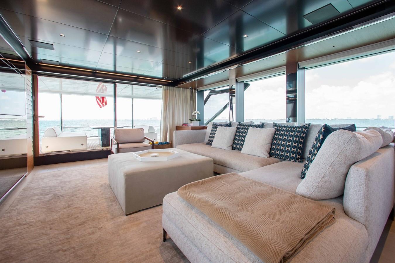 a room with couches and a window aboard KIYOMIZU Yacht for Sale