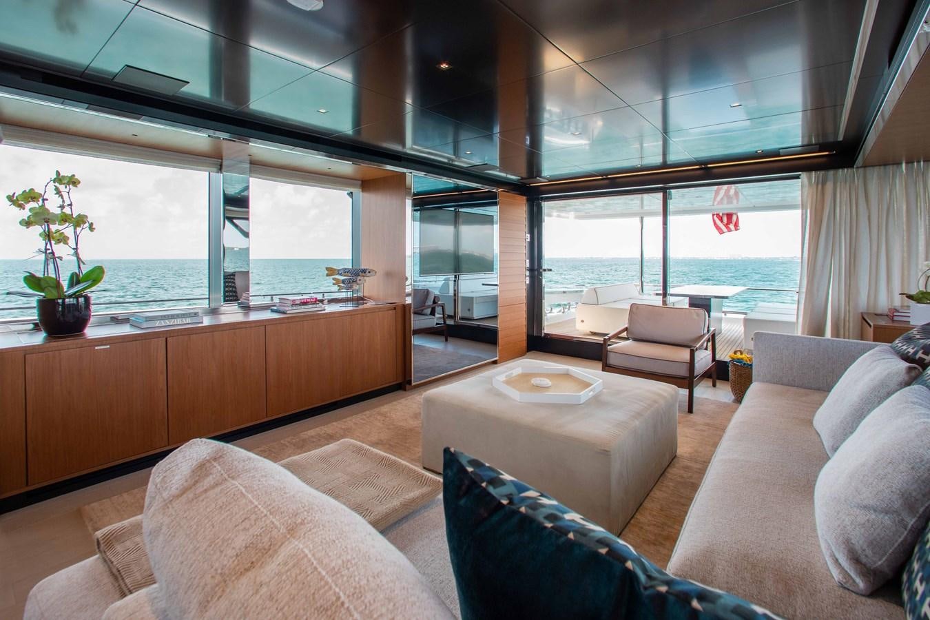 a modern looking living room aboard KIYOMIZU Yacht for Sale