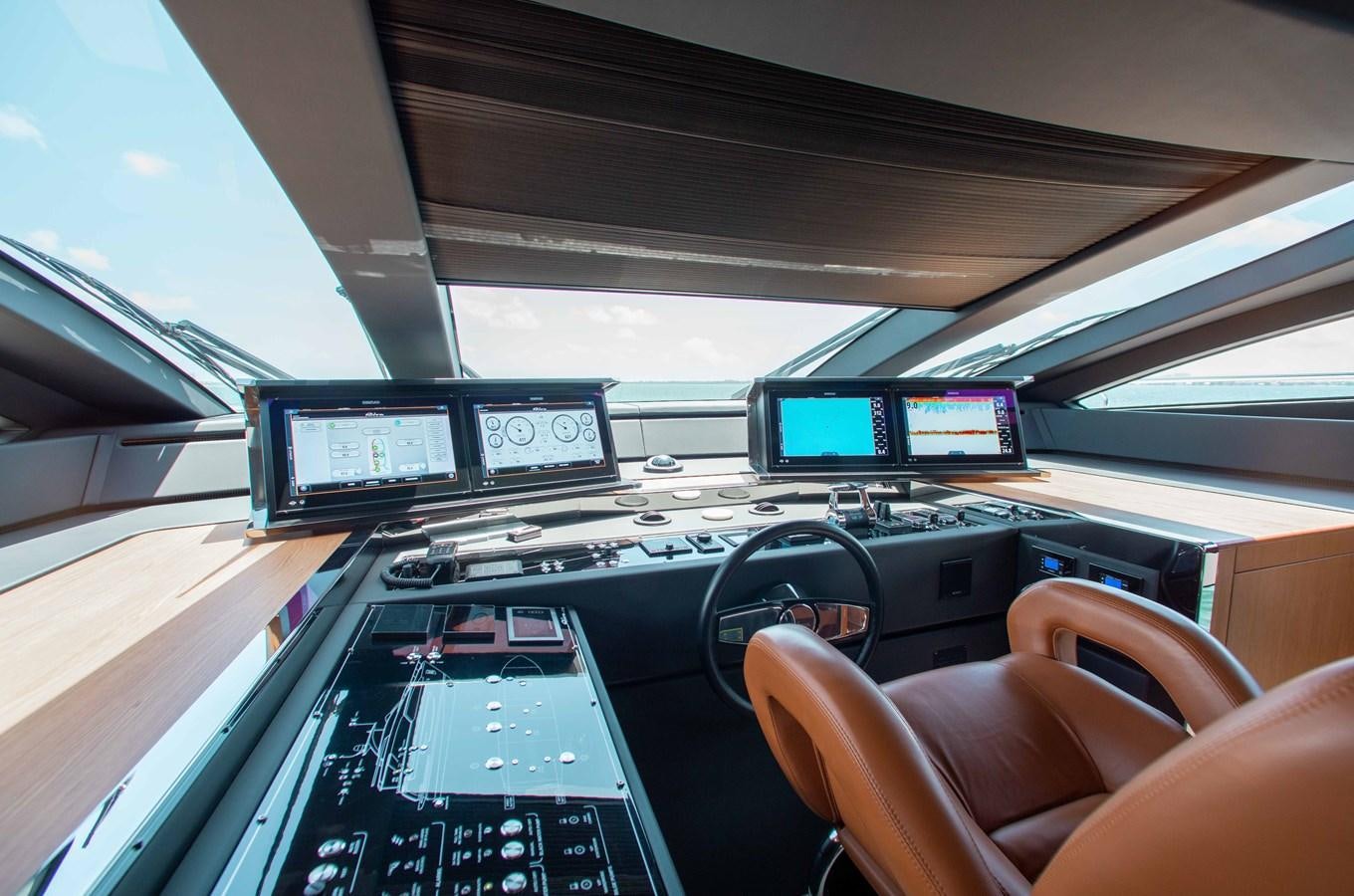 inside of a car with many screens aboard KIYOMIZU Yacht for Sale