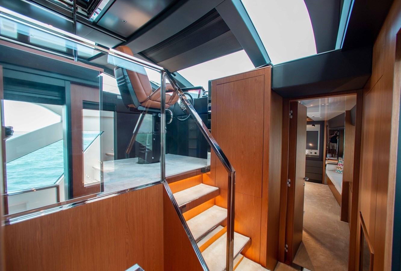 a person climbing a ladder aboard KIYOMIZU Yacht for Sale