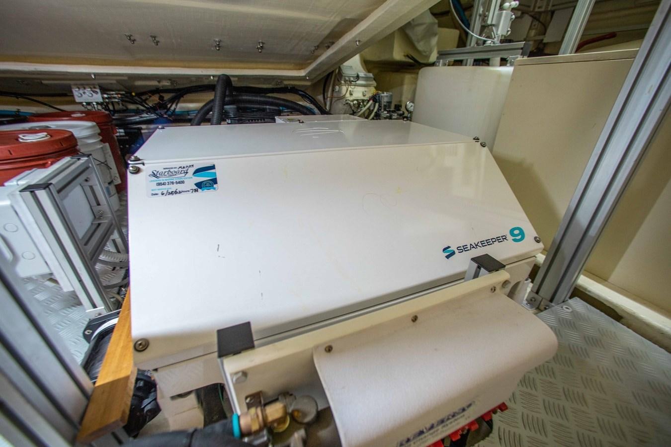 a large white machine aboard KIYOMIZU Yacht for Sale