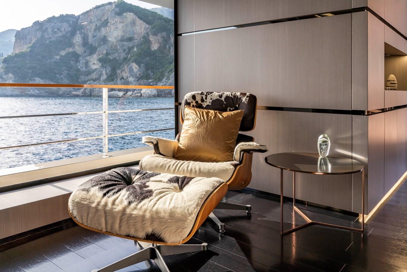 a chair on a porch aboard MAVERICK Yacht for Sale